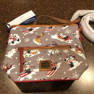New with tags Dooney & Bourke Disney bag. Wonderful winter scenery!